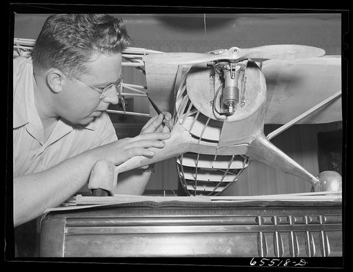 Wisdom, Montana. Len Smith building a model airplane