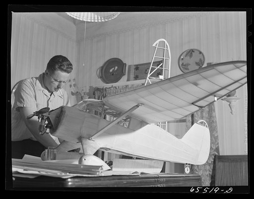 Wisdom, Montana. Len Smith building a model airplane