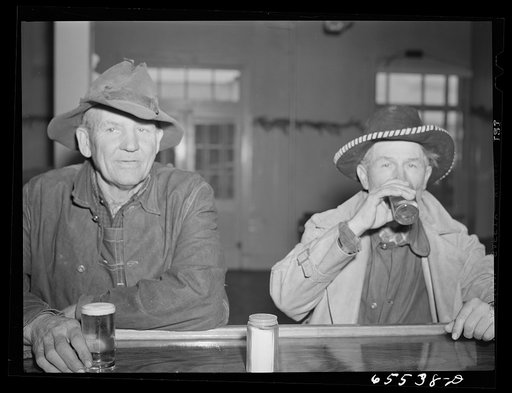 "[Untitled photo, possibly related to:  Hamilton, Montana. Sheep workers at the bar]"