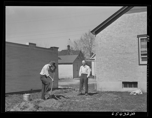 Missoula, Montana. Digging up ground for backyard garden