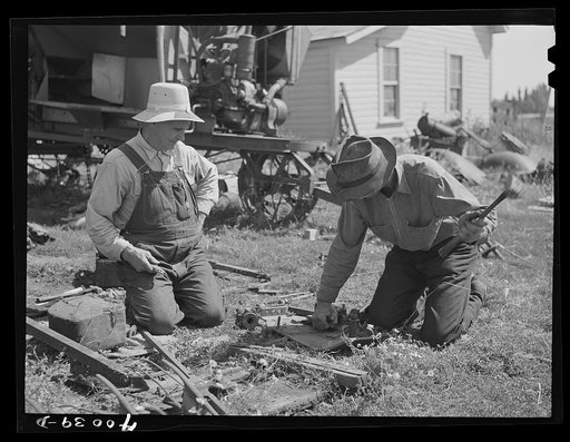 Repairing combine. Latah County, Idaho