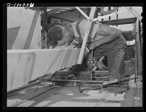Repairing combine, Latah County, Idaho