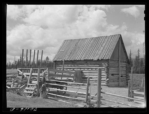 Barn and hay wagon in cut-over area. Boundary County, Idaho