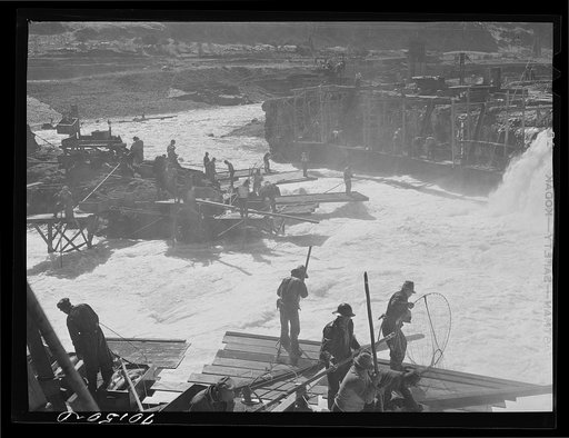 Indians fishing for salmon at Celilo Falls, Oregon. At the present time Indians have by treaty exclusive right for fishing in Columbia River which is adjacent to their reservation. This right is now being contested in lawsuits