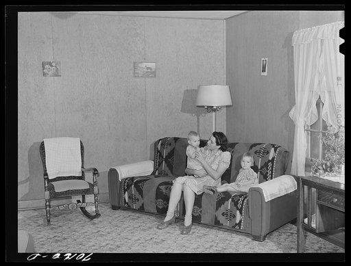 Untitled photo, possibly related to: In the living room of farm family, members of Boundary Farms, FSA (Farm Security Administration) project. Boundary County, Idaho