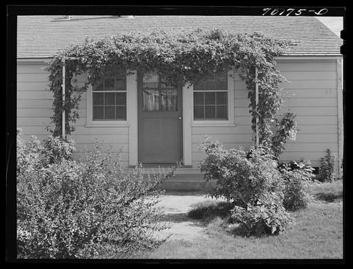 Front door of house for permanent farm workers at the FSA (Farm Security Administration) farm family migratory labor camp. Yakima, Washington