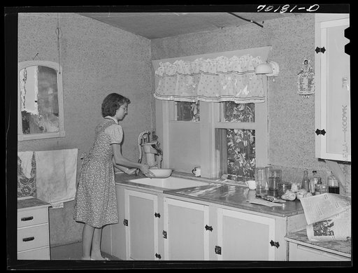 Daughter of FSA (Farm Security Administration) rehabilitation borrower who rents farmland from Indians. Yakima County, Washington. Sink was installed by tenant