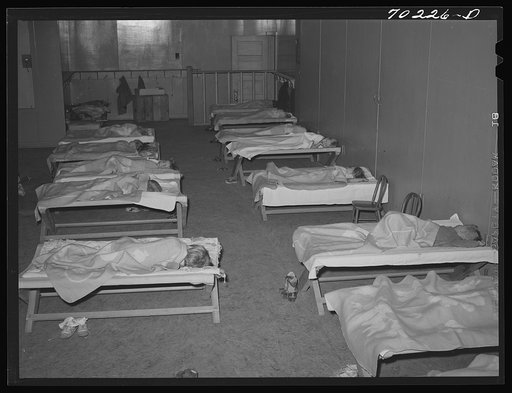 Nursery schoolchildren take their naps at the FSA (Farm Security Administration) farm family migratory labor camp. Yakima, Washington
