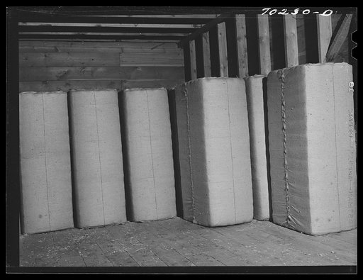 Untitled photo, possibly related to: Baled hops. Yakima County, Washington. Each bale weighs two hundred pounds. Price at this time thirty cents per pound. Yield per acre ten bales