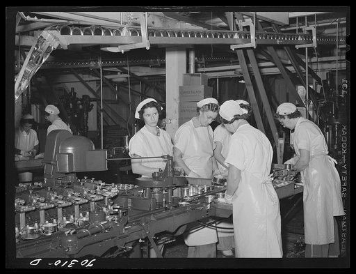 Sealing and inspecting cans of tuna fish. Columbia River Packing Association. Astoria, Oregon