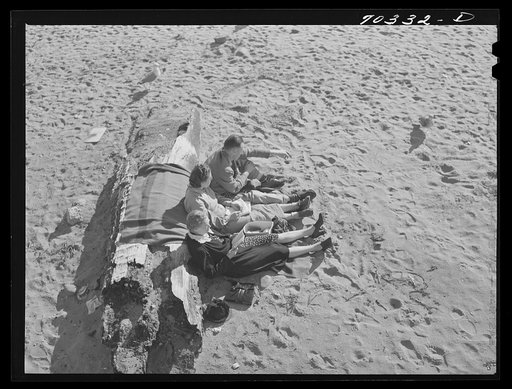 Sunbath on the beach. Seaside, Oregon