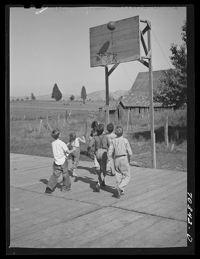 Basketball game. Children living at the FSA (Farm Security Administration) mobile camp for migratory farm workers. Odell, Oregon
