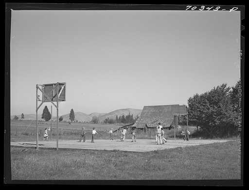 Basketball game. Children living at the FSA (Farm Security Administration) mobile camp for migratory farm workers. Odell, Oregon