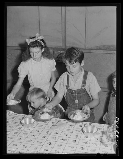 Untitled photo, possibly related to: Lunchtime at the nursery school at the FSA (Farm Security Administration) mobile camp for migratory farm workers. At Odell, Oregon