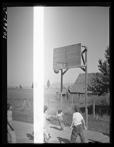 Untitled photo, possibly related to: Basketball game. Children living at the FSA (Farm Security Administration) mobile camp for migratory farm workers. Odell, Oregon