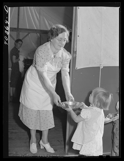 Lunchtime at the nursery school at the FSA (Farm Security Administration) mobile camp for migratory farm workers. Odell, Oregon