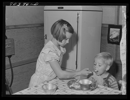 Lunchtime at the nursery school at the FSA (Farm Security Administration) mobile camp for migratory farm workers. Odell, Oregon
