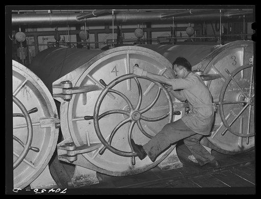 Closing ovens in which canned salmon is cooked. Columbia River Packing Association, Astoria, Oregon