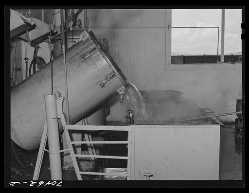 Head, tails, etc. of salmon are boiled and the fish oil is reclaimed at the Columbia River Packing Association. Astoria, Oregon