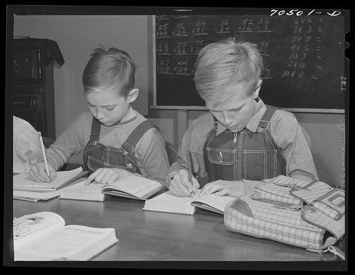 Children of workmen at the Umatilla ordnance depot have their school classes in basement of church. Hermiston, Oregon