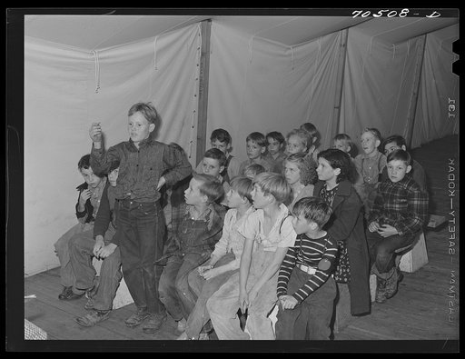 Meeting of the Junior Campers League at the FSA (Farm Security Administration) mobile camp for migratory farm workers . Odell, Oregon