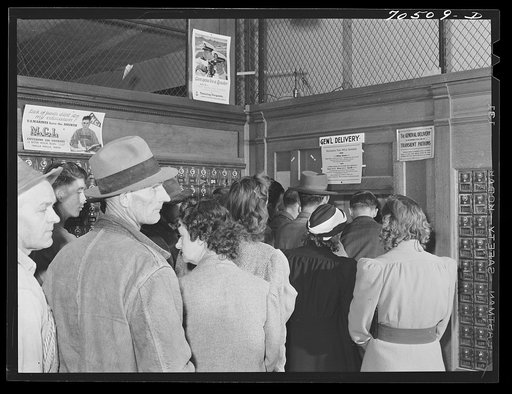 Lineup at general delivery window at the post office in Hermiston, Oregon. This post office served about eight hundred people a year ago; now it has more than five thousand general delivery patrons