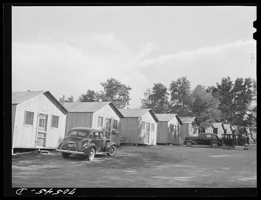 Cabin court, Hermiston, Oregon. This court for workmen at the Umatilla rdnance depot was built in two weeks; people moved in before the doors were up. Each unit of one room rents for eight dollars per week. They have gas, electricity, running water and sink, and adequate furniture. Sanitary faciliti