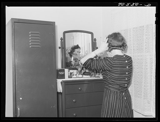 Room in FSA (Farm Security Administration) dormitories occupied by women who work at the Navy shipyards. Bremerton, Washington