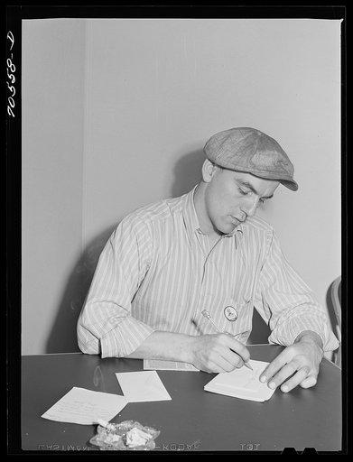Workman at Navy shipyards at FSA (Farm Security Administration) duration dormitories. Bremerton, Washington