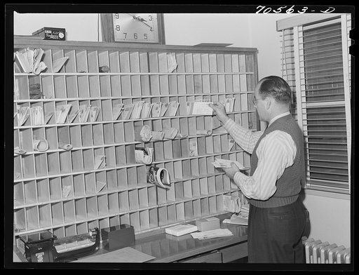 Mail racks for occupants of the FSA (Farm Security Administration) duration dormitories for workers at the Navy shipyards. Bremerton, Washington