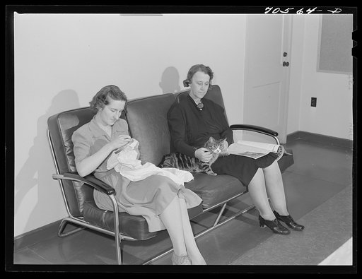 Women who work at the Navy shipyards in the community room for women at the FSA (Farm Security Administration) duration dormitories. Bremerton, Washington