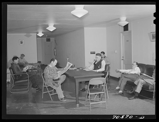 Men who work at the Navy shipyards in the community room at the FSA (Farm Security Administration) dormitories. Bremerton, Washington