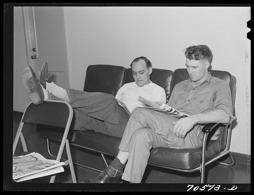 Workmen at the Navy shipyards in the community room at the FSA (Farm Security Administration) duration dormitories. Bremerton, Washington