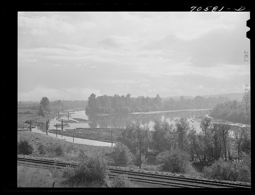 Untitled photo, possibly related to: Log rafts in Columbia River. Cowlitz County, Washington