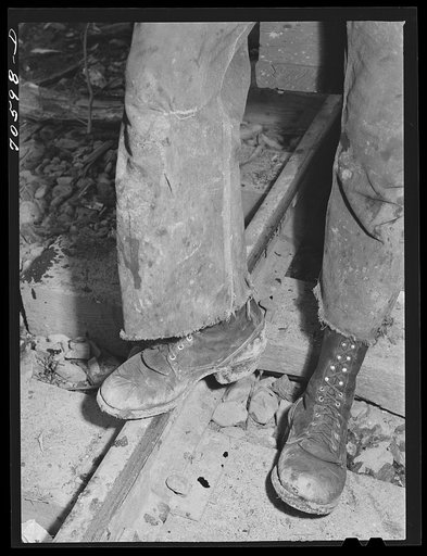 Long Bell Lumber Company, Cowlitz County, Washington. Stagged pants and boots of lumberjack