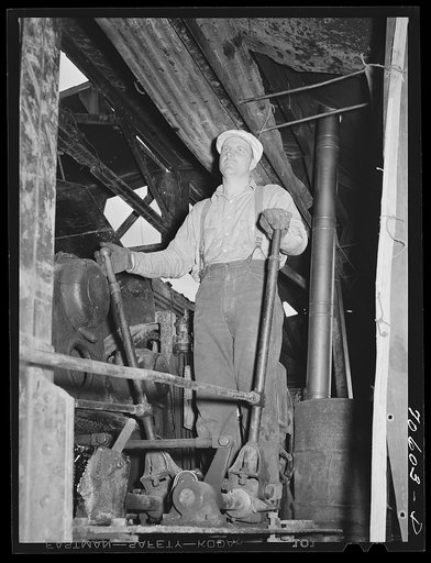 Long Bell Lumber Company, Cowlitz County, Washington. Operator of loading machine powered by electricity in woods operation