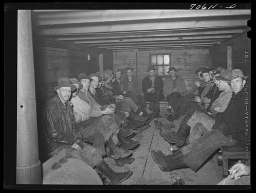Untitled photo, possibly related to: Long Bell Lumber Company, Cowlitz County, Washington. Lumberjacks in one of the crummies, a railroad car which transports them to the woods from the town of Ryderwood