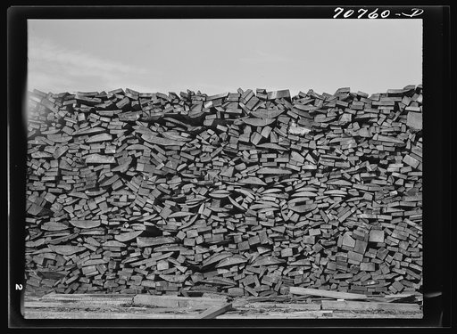 Pile of wood used for fuel at the Tillamook cheese plant. Tillamook, Oregon