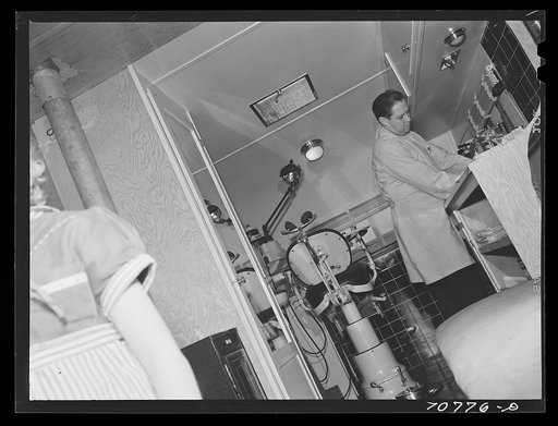 Untitled photo, possibly related to: FSA (Farm Security Administration) dentist in the FSA dental trailer. Caldwell, Idaho