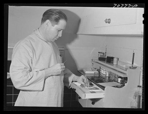 FSA (Farm Security Administration) dentist in the FSA dental trailer. Caldwell, Idaho