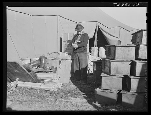 Checking in equipment from FSA (Farm Security Administration) mobile camps as it arrives at the FSA permanent camp at Caldwell, Idaho for winter storage