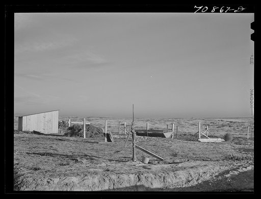 Shed and well pump of farmer who is just starting to farm on the Black Canyon Project. Canyon County, Idaho