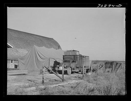 Untitled photo, possibly related to: Equipment from the FSA (Farm Security Administration) mobile camps arrives at the permanent camp at Caldwell, Idaho