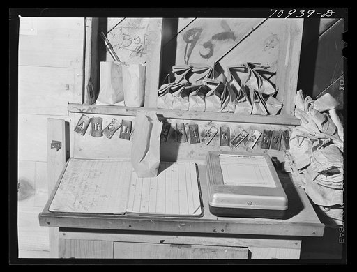 Samples of seed at desk in seed mill. Ontario, Oregon
