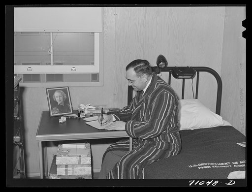 Vallejo, California. Workman at Mare Island shipbuilding yards in his room at FSA (Farm Security Administration) dormitories