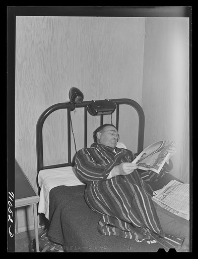 Untitled photo, possibly related to: Vallejo, California. Workman at Mare Island shipbuilding yards in his room at FSA (Farm Security Administration) dormitories