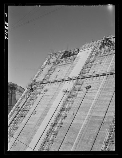 Looking up face of Shasta Dam, under construction. Shasta County, California