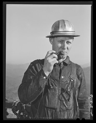 Workman at Shasta Dam. Shasta County, California