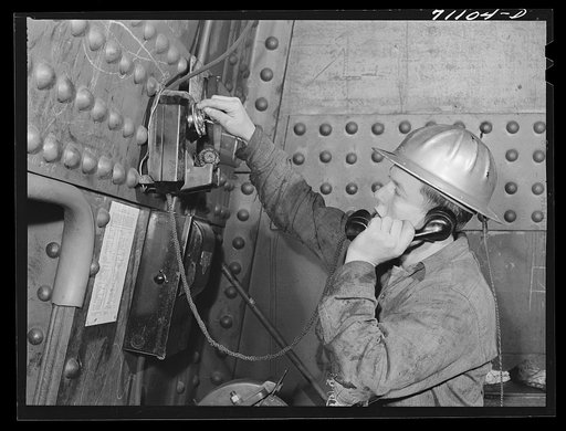 Various sections of construction work at Shasta Dam are connected by telephones. Shasta County, California