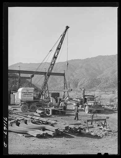 Bending reinforcing steel which will be used in construction of Shasta Dam. Shasta County, California